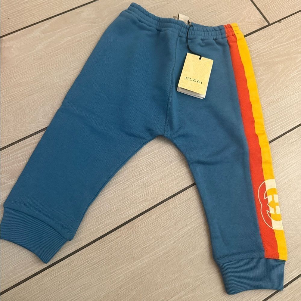 Brand new Gucci Kids Blue Jogger Pants Gg logo on side size 2